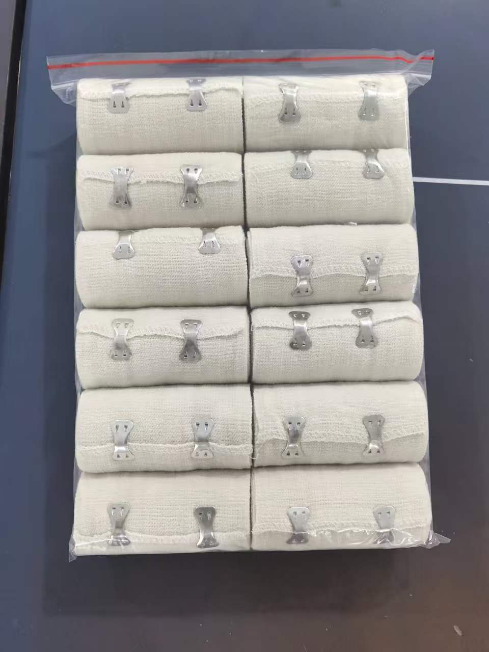 Novo lançamento médico da Haorun: Bandagem de tecido liso de spandex de 105g e 120g com borda lisa (branco natural) - perfeita para o mercado sofisticado